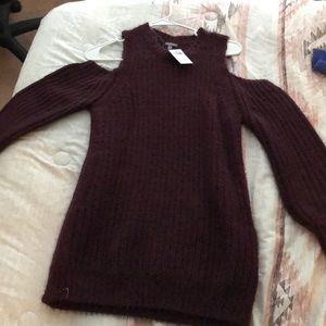 Long sleeved shoulderless sweater
